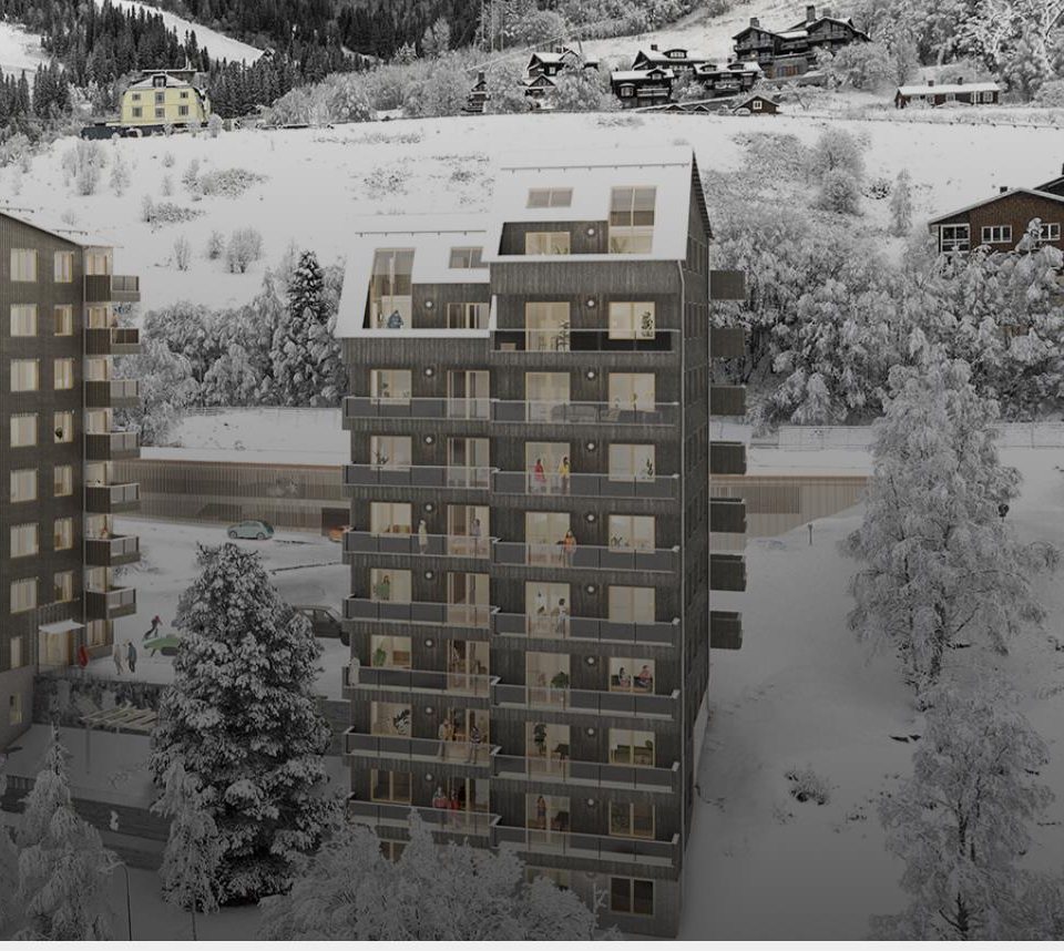 Visualisering av flerbostadshus i trä på snötäckt sluttning i Åre by med skidbackar bakom.